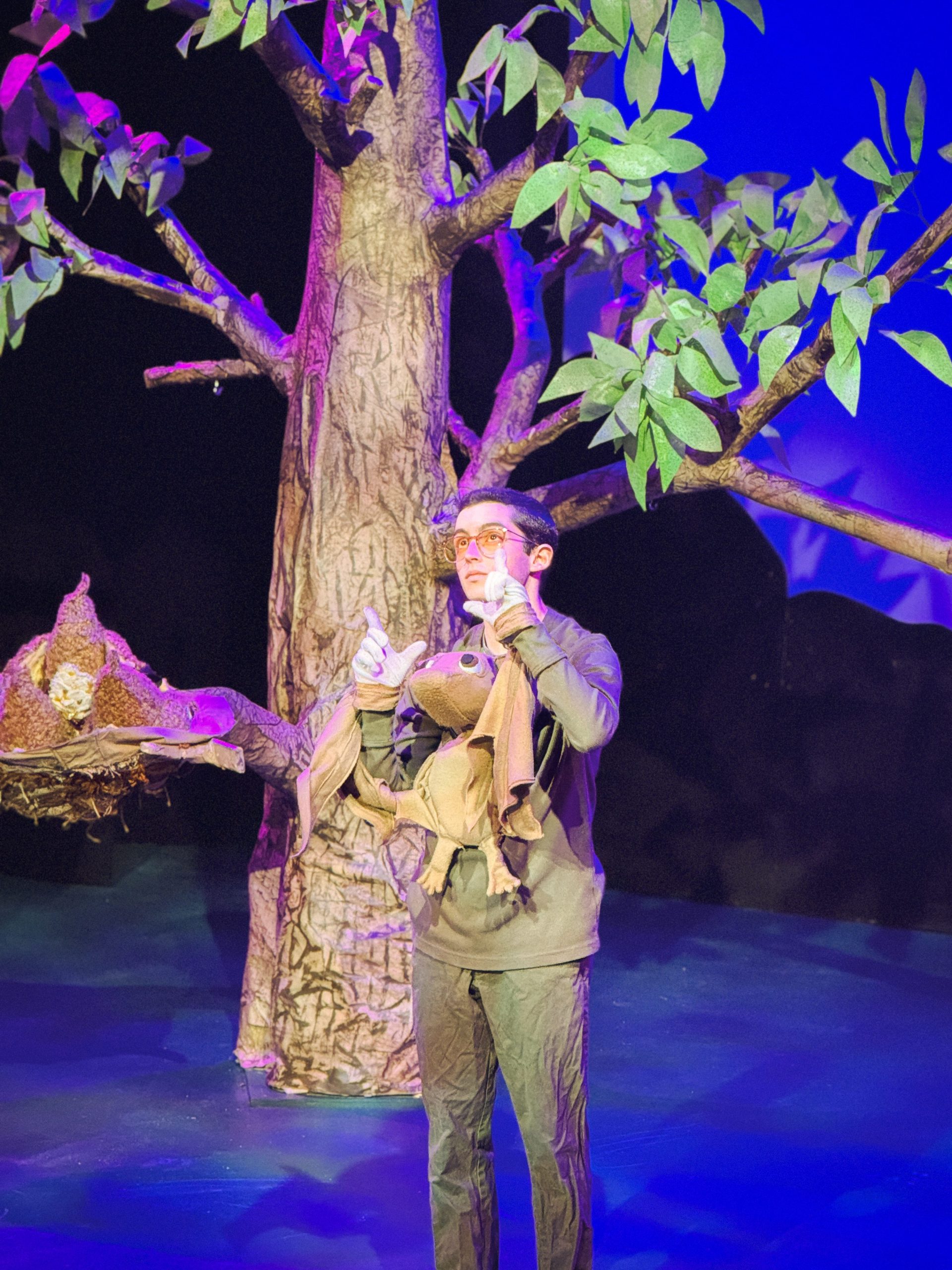 Luca Capalbo performs as Stellaluna the bat, using the puppet's wing attachments to sign in ASL during the Children's Museum & Theatre of Maine's first ASL-integrated production.