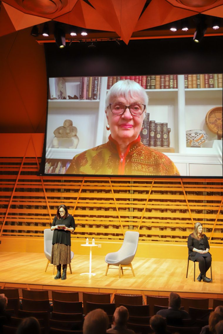 Carolyn Lukensmeyer being introduced by Jacqueline Edmondson ahead of the documentary screening.