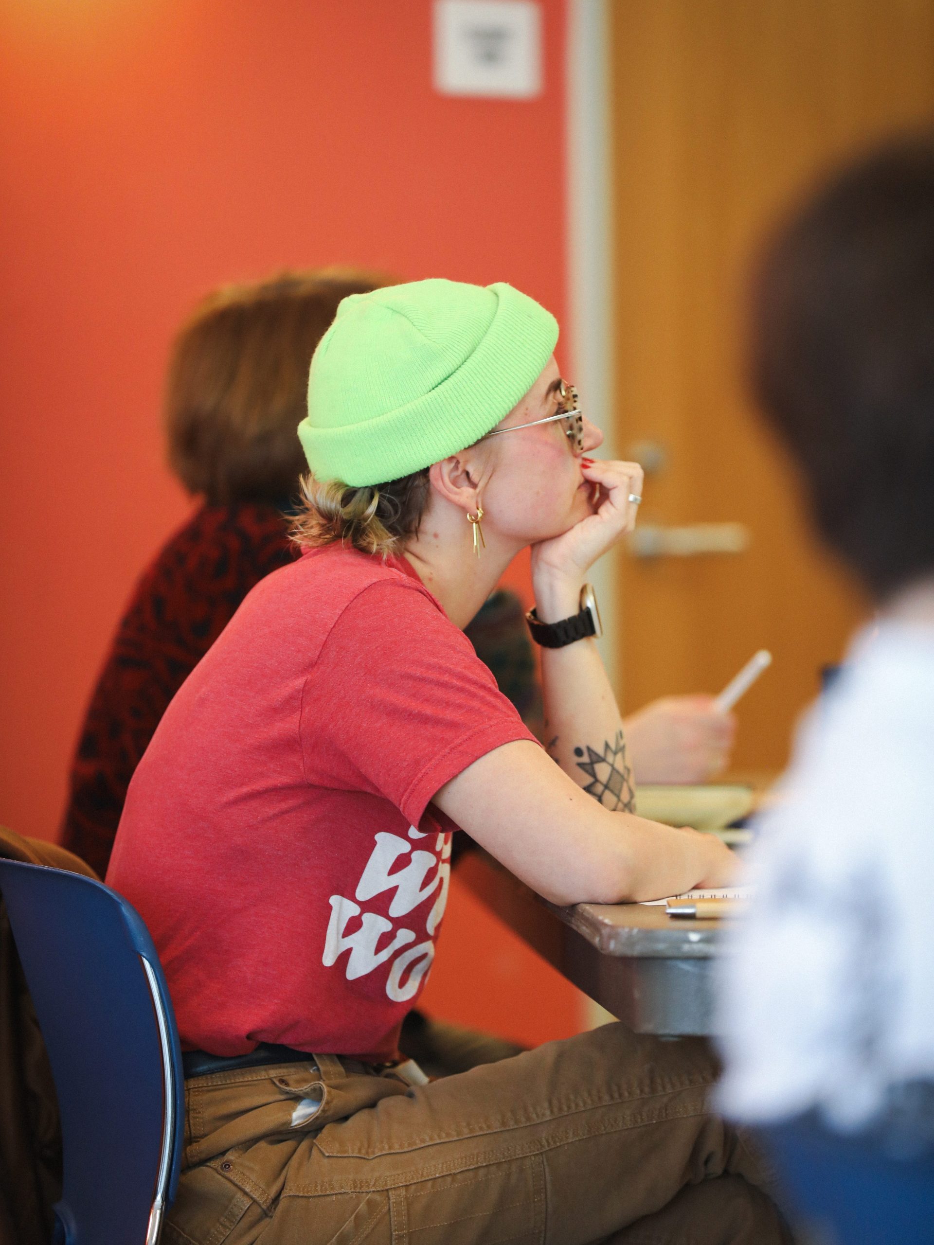 Judge Janna Ahrndt watches student team present pitch at innovation challenge