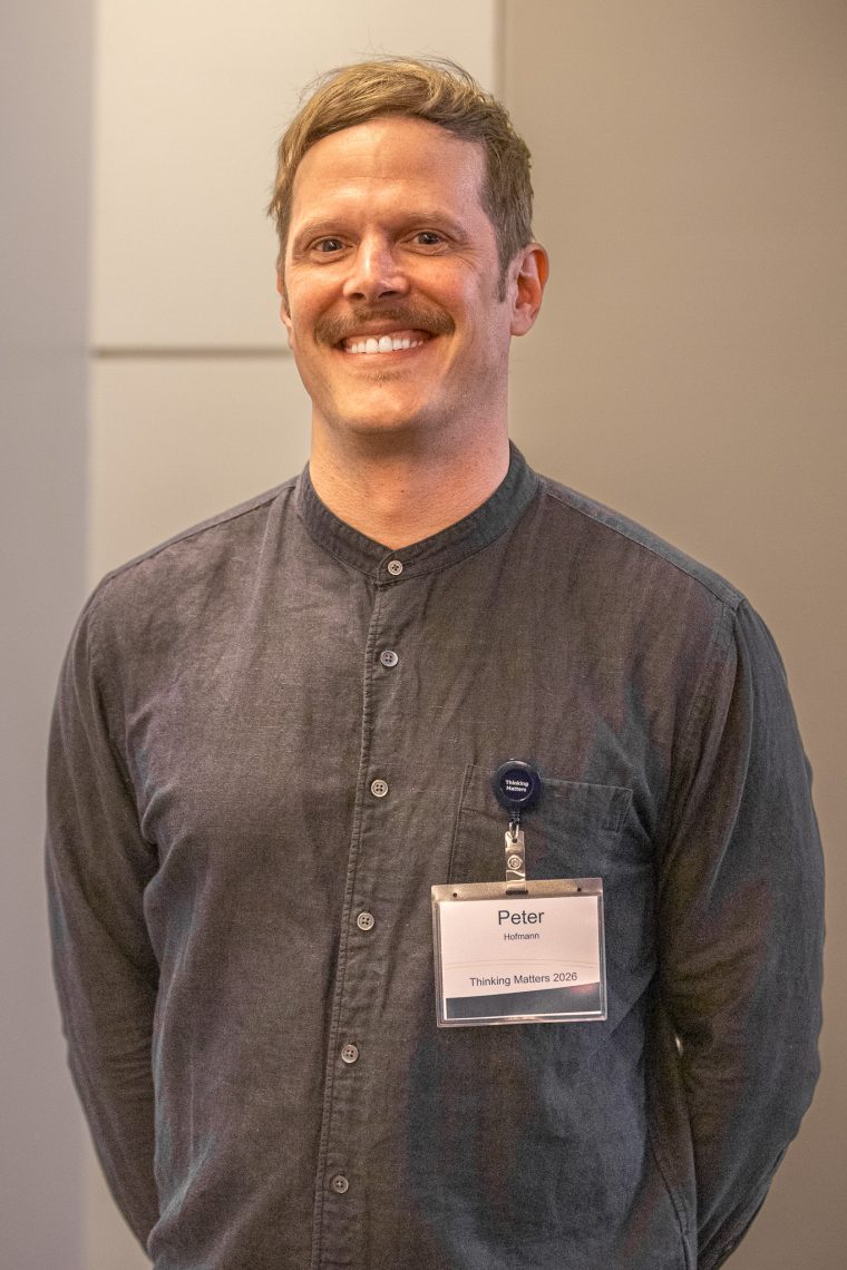 Peter Hofmann, a doctoral student in leadership presenting at Thinking Matters.
