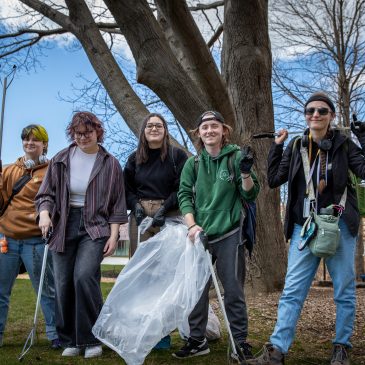 Members of the Environmental Science and Policy Student Group doing a Portland Campus clean-up.