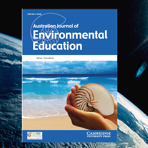 the cover of environmental education publication features an image of hands holding a shell on the beach with the ocean in the background
