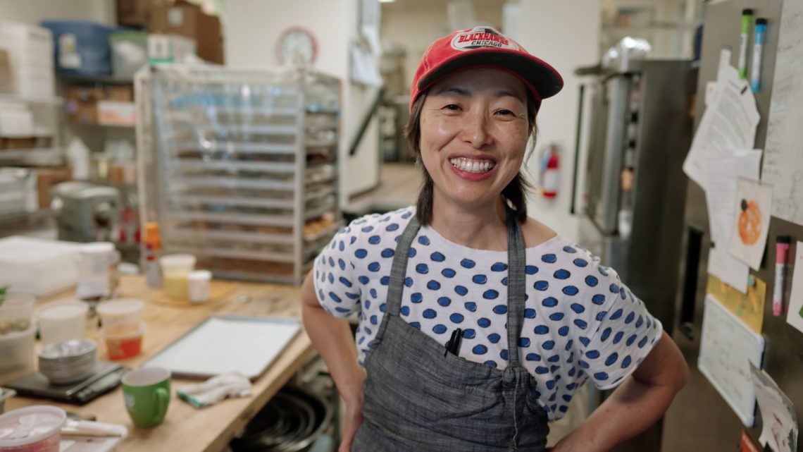 A still of Atsuko Norimoto in a bakery from WMPG documentary "An Extraordinary Place".