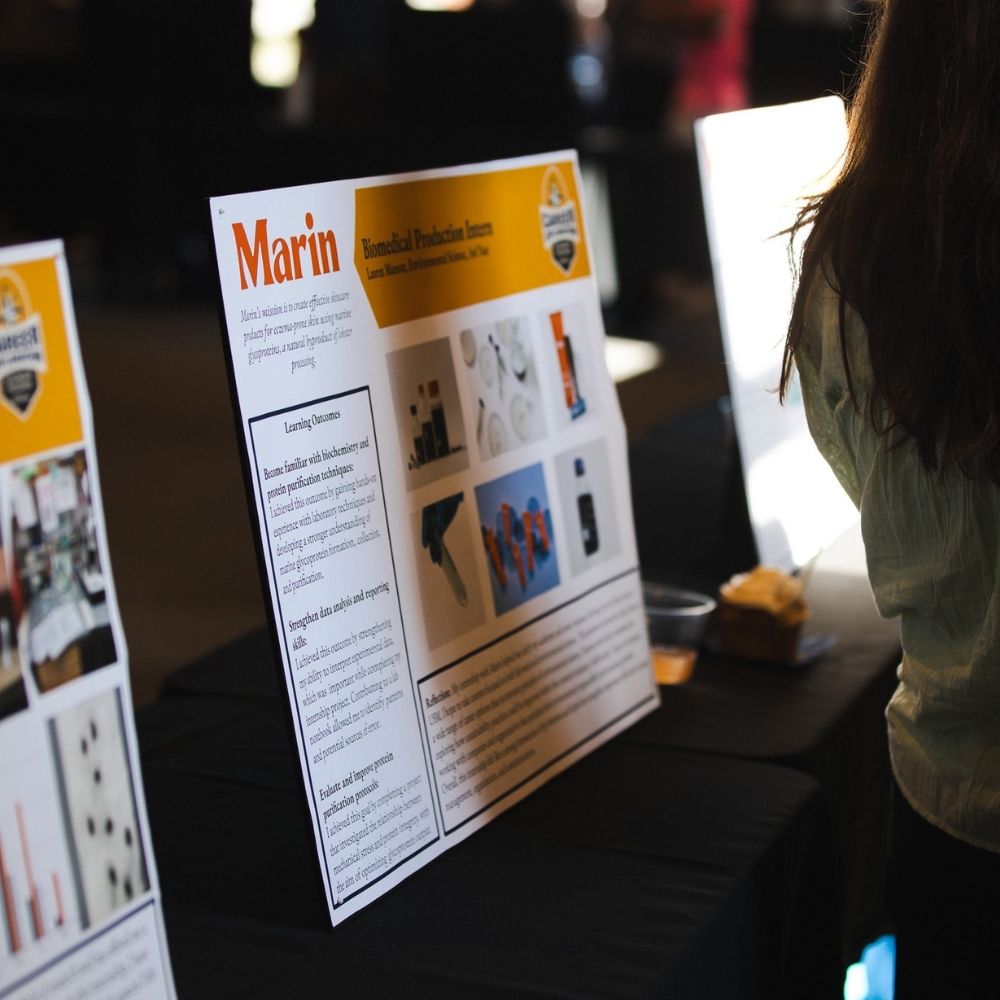 Presentation board at a Career Hub Internship Presentation event.