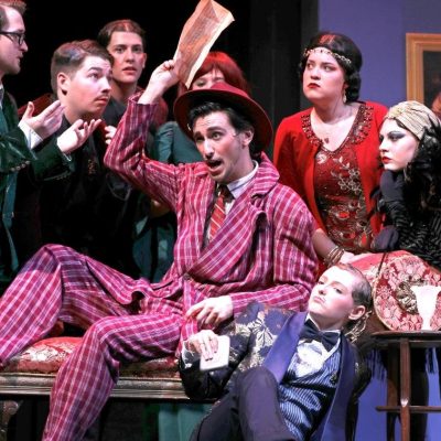 Cast of Gianni Schicchi posed on stage during a run of the Opera.