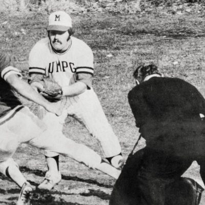Al Bean playing college baseball - black and white image.