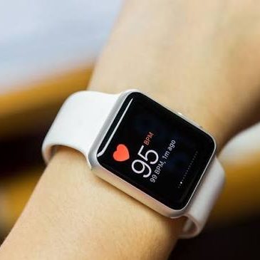 A biometric watch is shown on a wrist. Heart rate is 95.