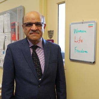 Written on the door to Professor Mehrdaad Ghorashi's office is the slogan of Iranian protesters, "Woman, Life, Freedom."