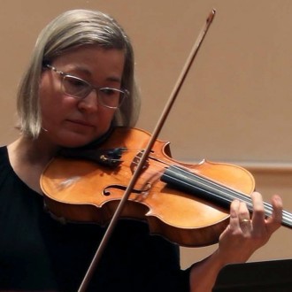 Kimberly Lehmann coaxes a note out of her viola.