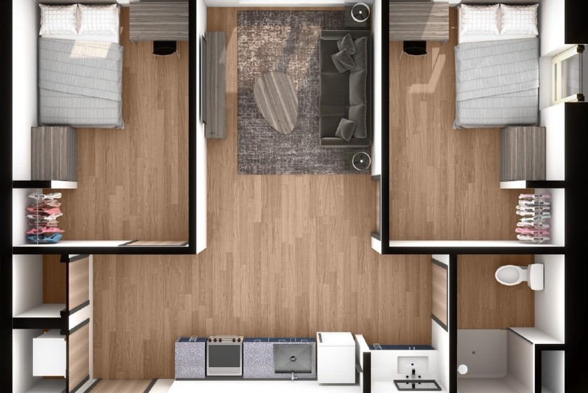 Overhead view of a two-person, two-bedroom apartment with a shared kitchen, bathroom, common area, closet, and washer and dryer.