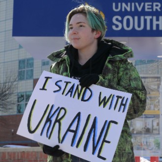 Students and faculty unite for a pro-Ukraine demonstration outside Glickman Library.