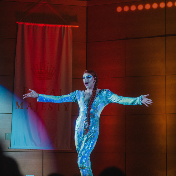 25th Royal Majesty Drag Show Host, Gigi Gabor, standing with arms open