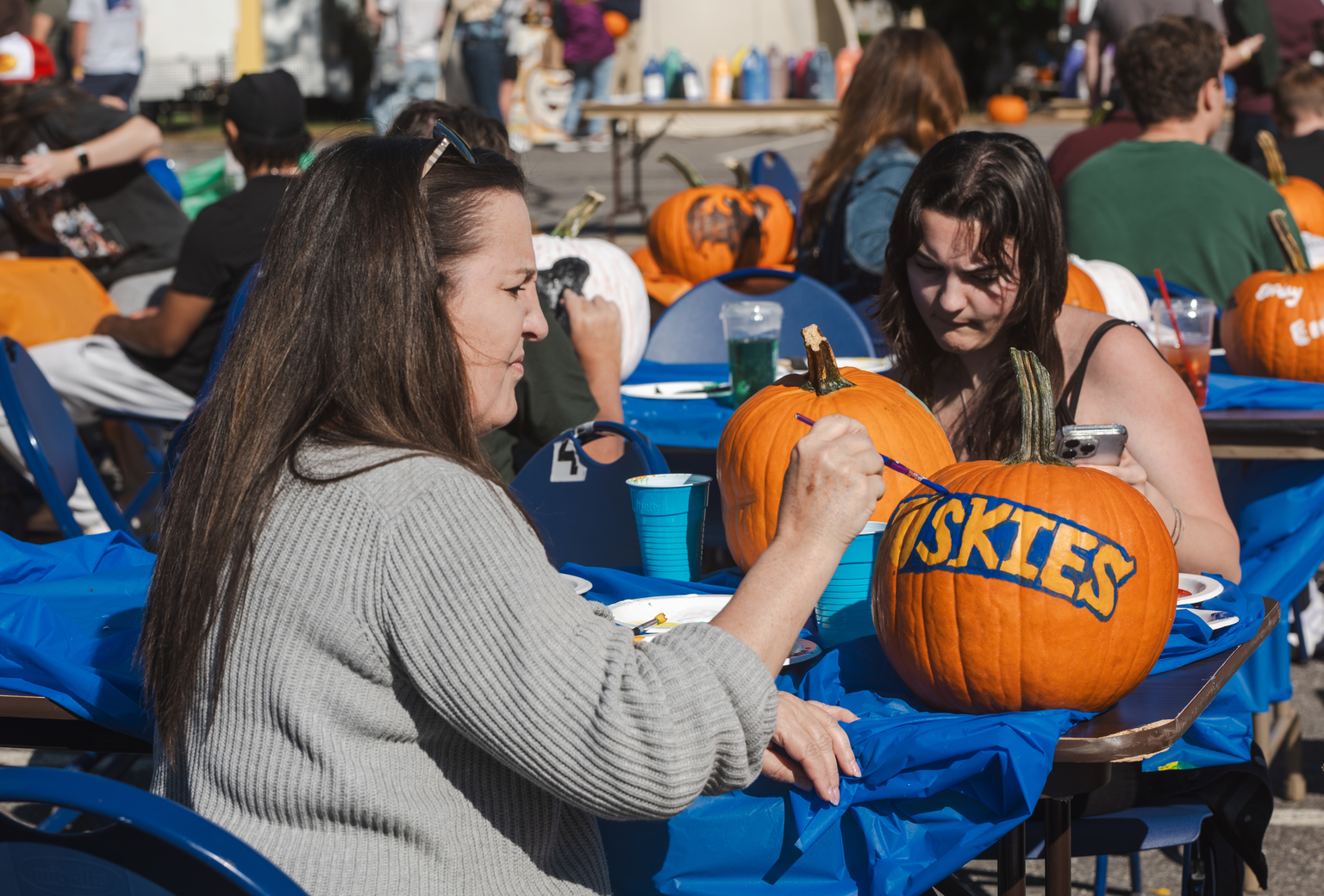 Fall Fest pumpkin painting, part of USM's Homecoming and Family Weekend