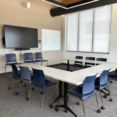 Conference room with chairs around U-shaped table