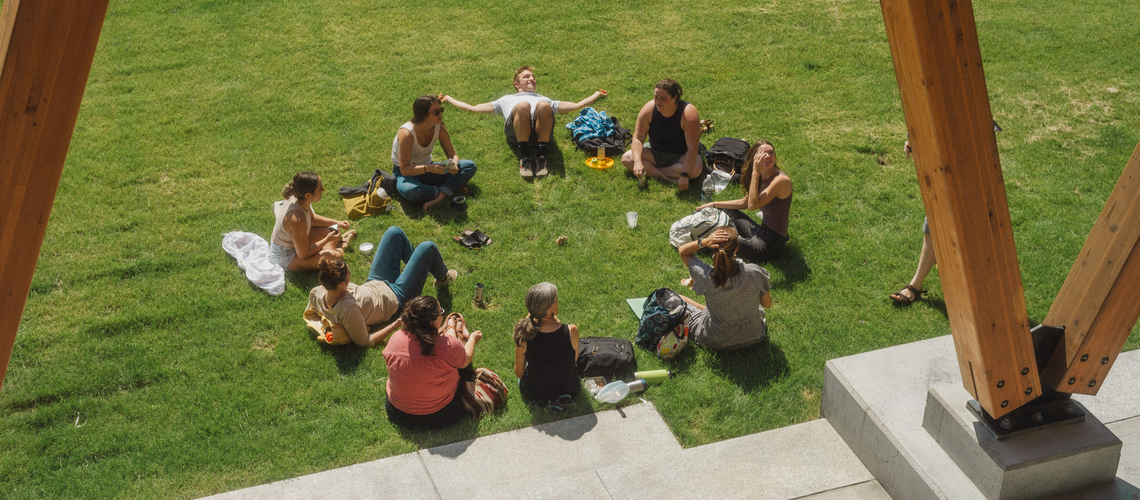 Students enjoying community hour in front of mcgoldrick