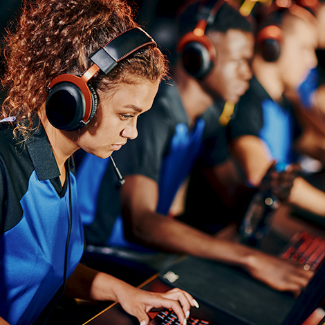 A team of students engaged in an esports game.