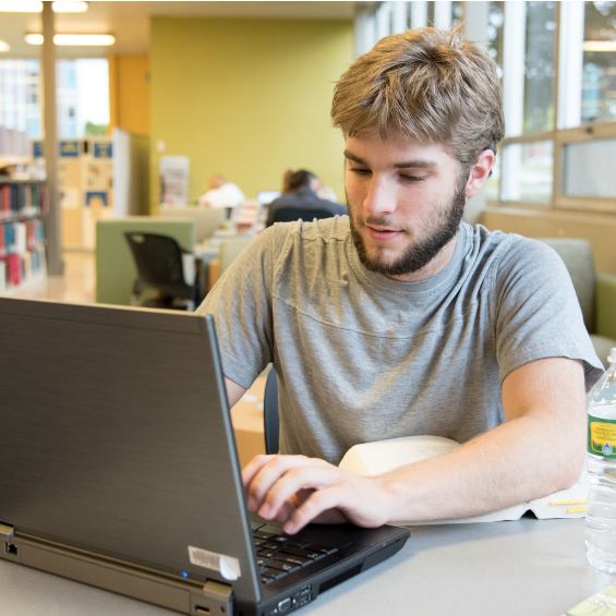 student sitting at computer
