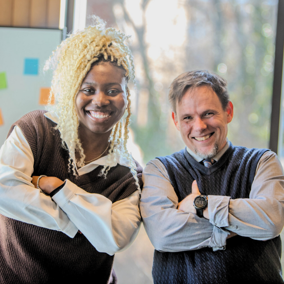 TRIO student and TRIO Advisor smiling