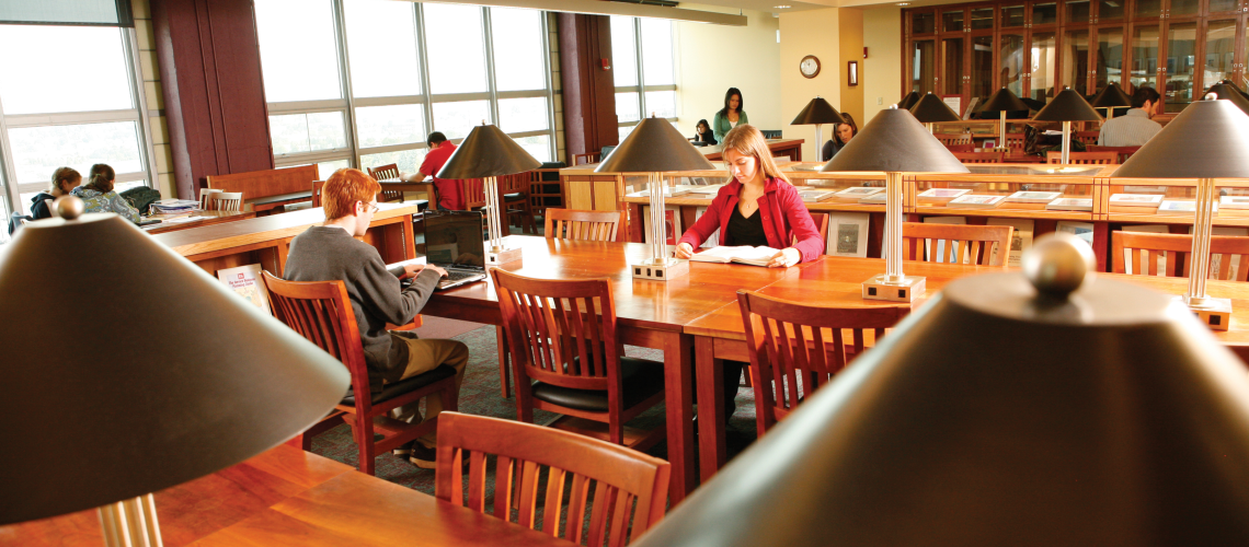 students studying in the 7th floor reading room of Glickman Library, Portland Campus