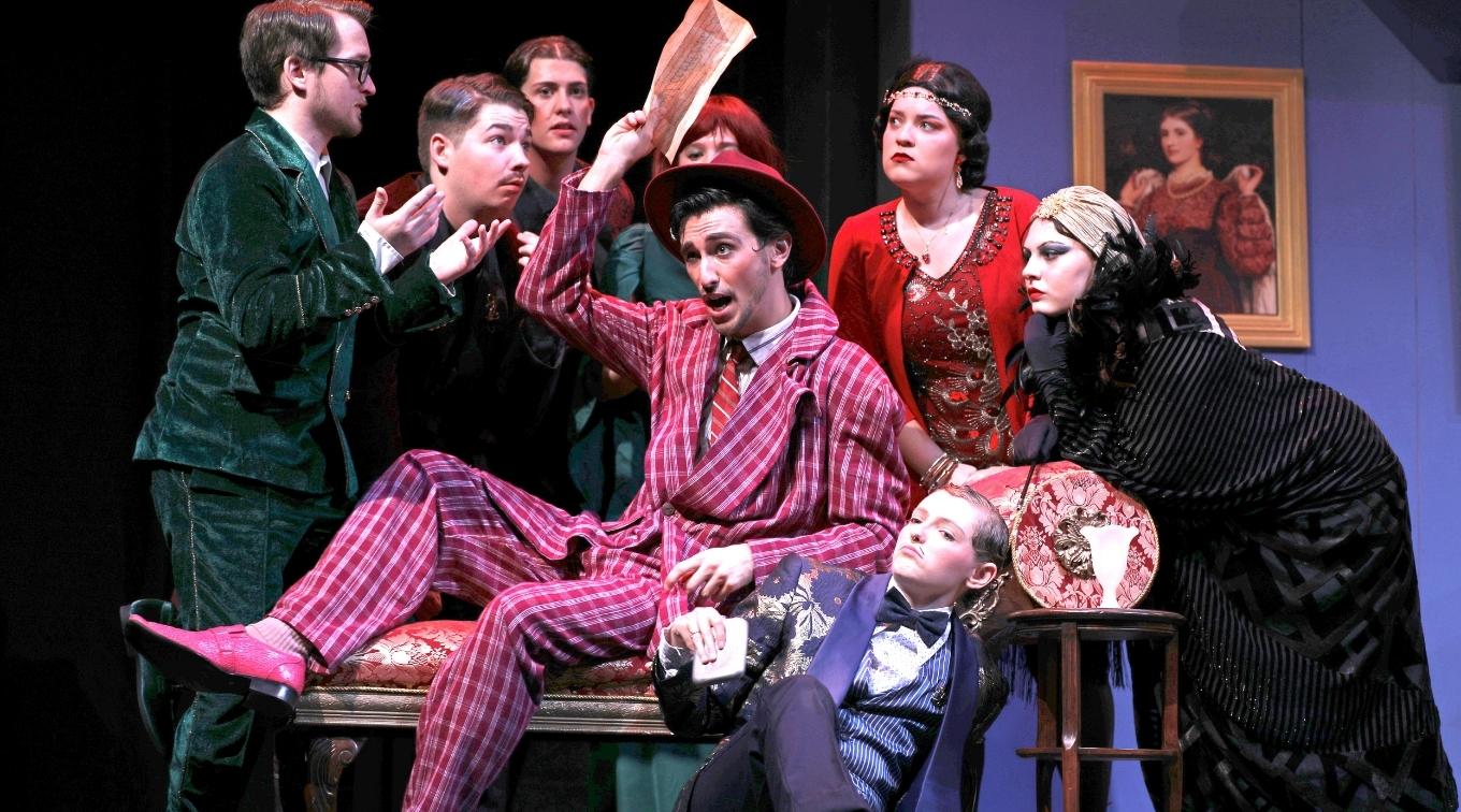 Cast of Gianni Schicchi posed on stage during a run of the Opera.