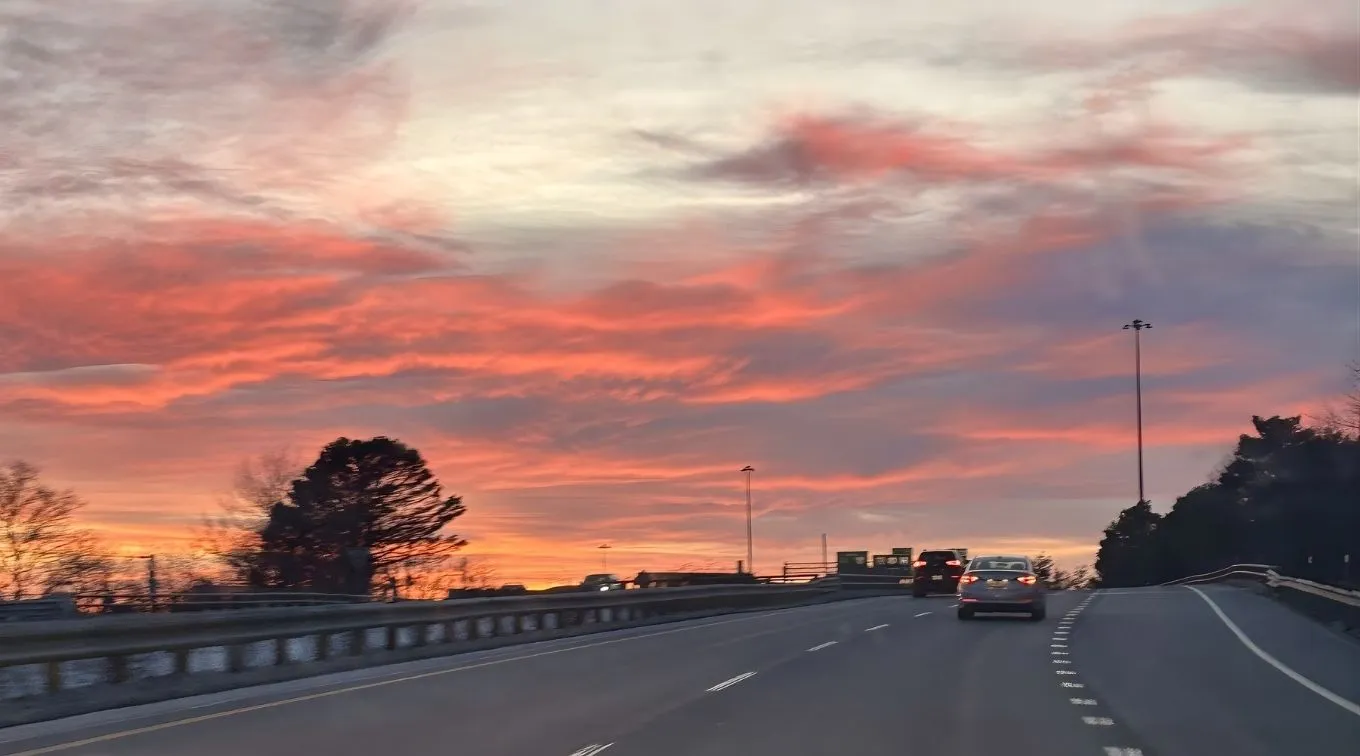 charlotte_driving_pretty_sky