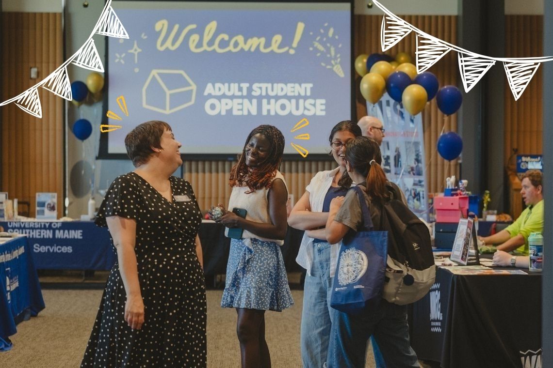 Gina Capra chatting with students at a previous Adult Students Open House at USM.
